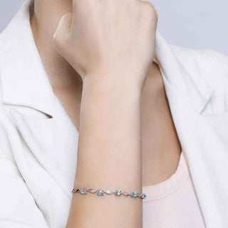 Сребърна гривна - Blue topaz